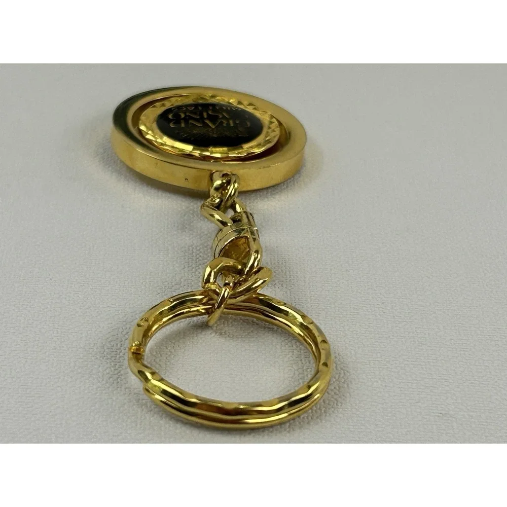 Vintage Grand Casino Mille Lacs Gold Tone Spinner Keychain Fob Souvenir